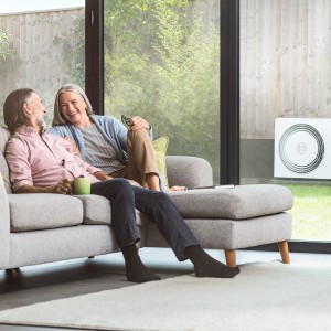 couple sitting on sofa couple sitting on sofa
