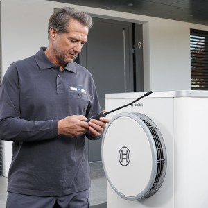 installer in front of bosch heat pump installer in front of bosch heat pump