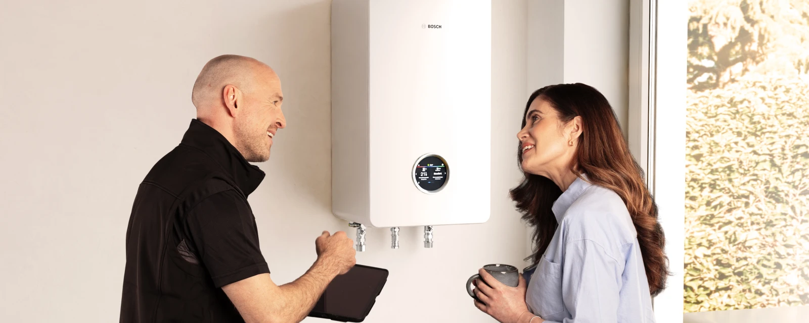 CS5800i G utility room with installer and customer