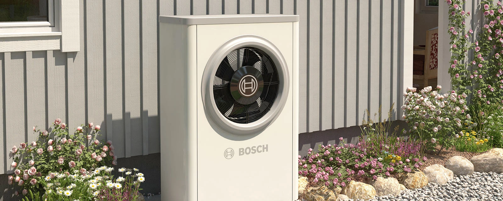 The heat pump is located in front of a Scandinavian house.