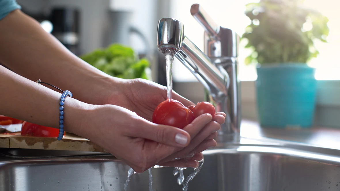 Washing hands with domestic hot water