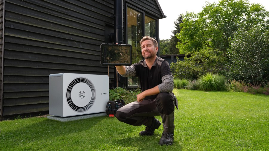 Installer in front of heat pump Install#LikeABosch