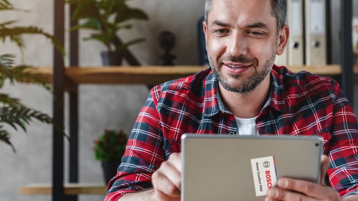 Contractor using lead management tool on tablet