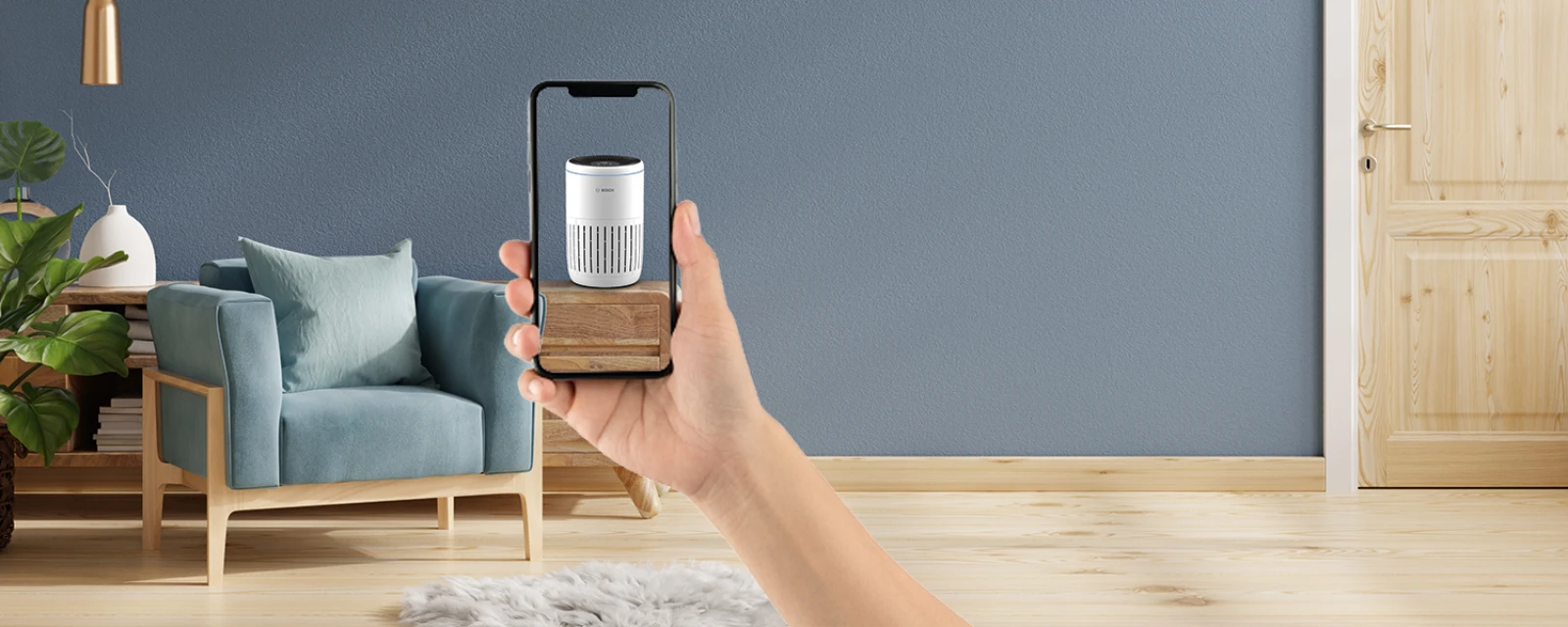 Luftreiniger wird mit Hilfe eines smartphones virtuell in den Raum platziert.