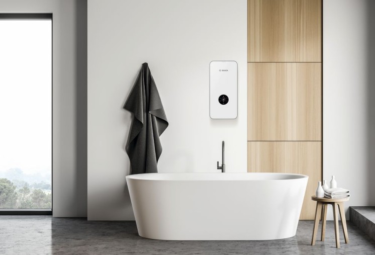Tronic 8500i von Bosch an der wandhängend in modernem Badezimmer Tronic 8500i von Bosch an der wandhängend in modernem Badezimmer