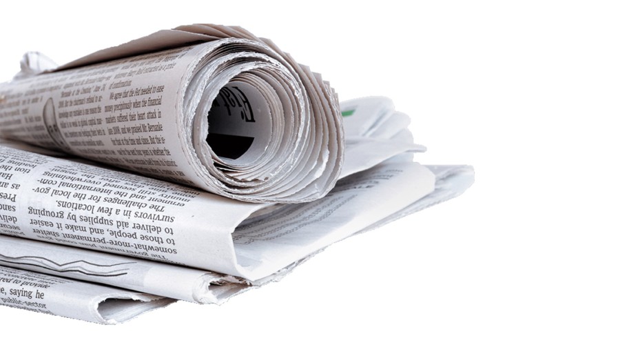 Zusammengerollte Zeitung Zusammengerollte Zeitung