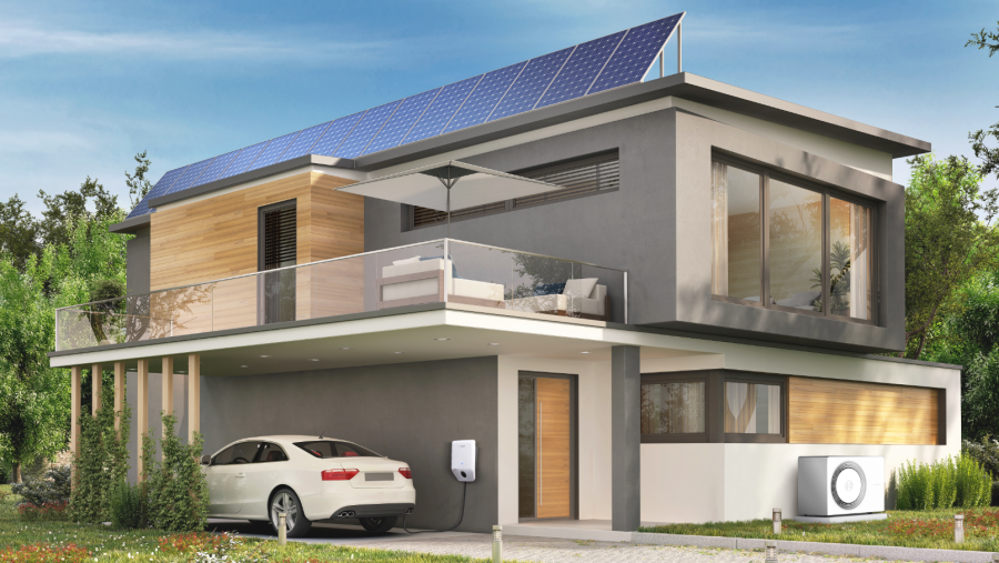Ein modernes Haus mit einer Wallbox von Bosch. Ein modernes Haus mit einer Wallbox von Bosch.