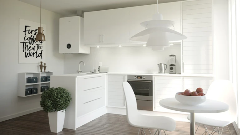 Die wandhängende Gasheizung Condens 5700i WT in einer Küche.