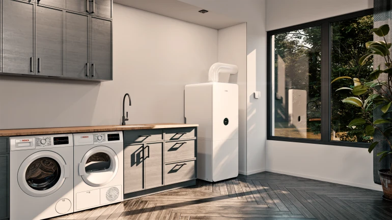 Gas-Brennwertgerät Condes 5300i WM bodenstehend in der Waschküche.