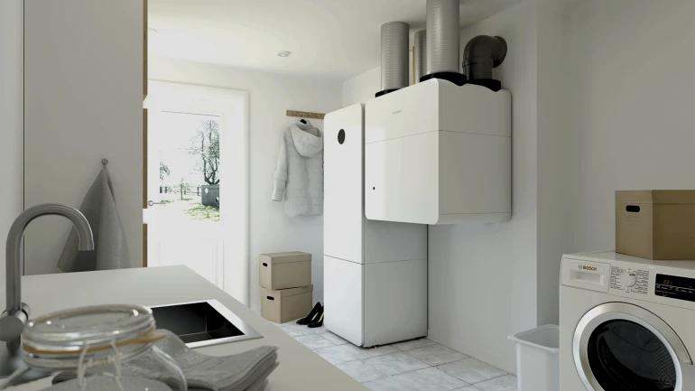 Innenaufstellung einer Erdwärmepumpe von Bosch und einer Wohnungslüftung im Erdgeschoss