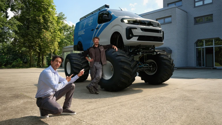 Installer in front of monster truck Install Like a Bosch
