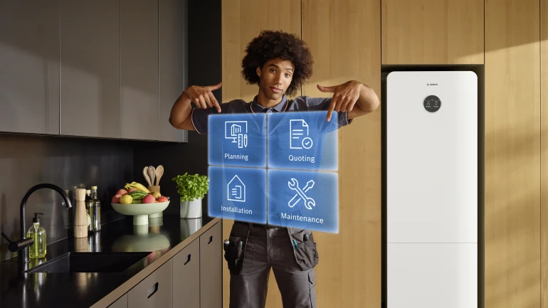 Installer showing digital tools Install Like A Bosch