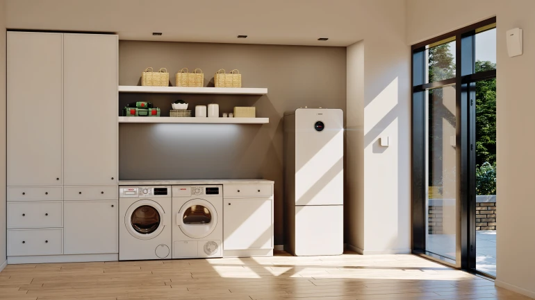Bosch maalämpöpumppu kodinhoitohuoneessa.