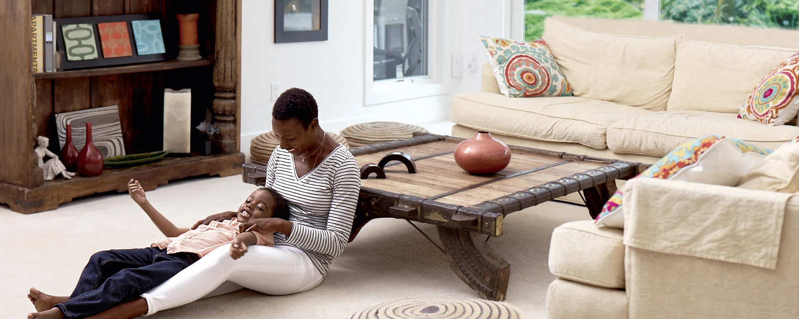 Mother and child in a living room.