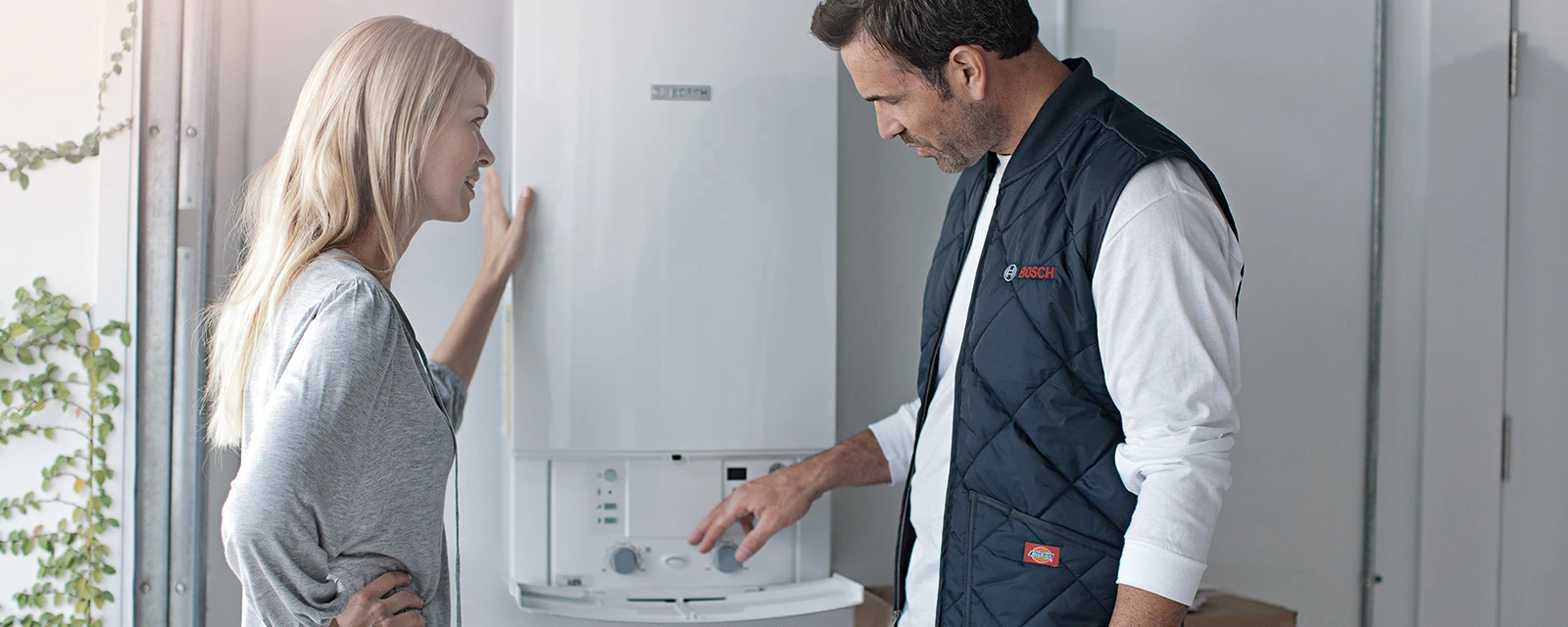 Two Men in Front of a Boiler