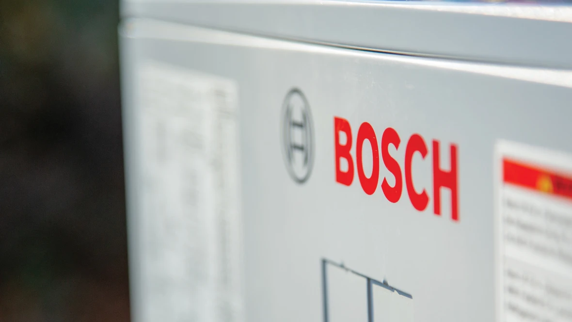 Red Bosch logo on a heat pump
